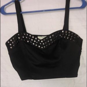 Crop top. Fits big in cleavage area